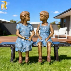 life size bronze boy and girl statue
