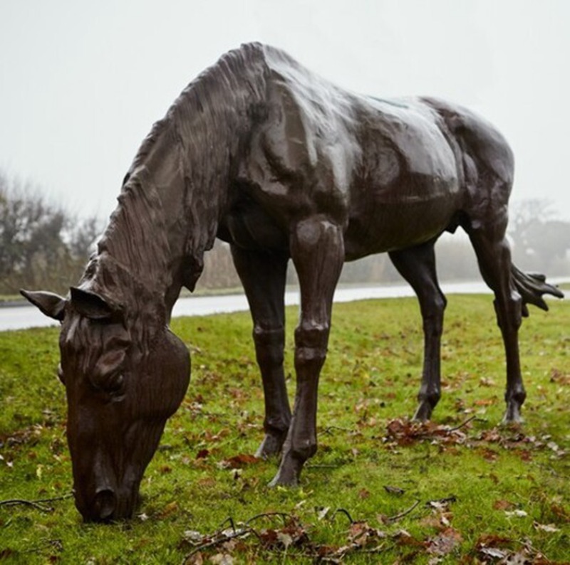 bronze grazing horse garden statue