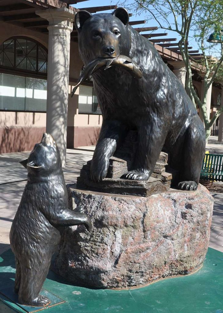 bronze bear with fish in mouth statue (2