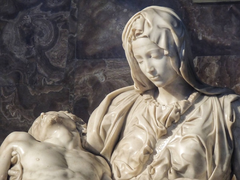 intricate details of marble pieta sculpture