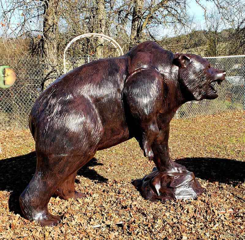 metal-bear-on-rock-statue