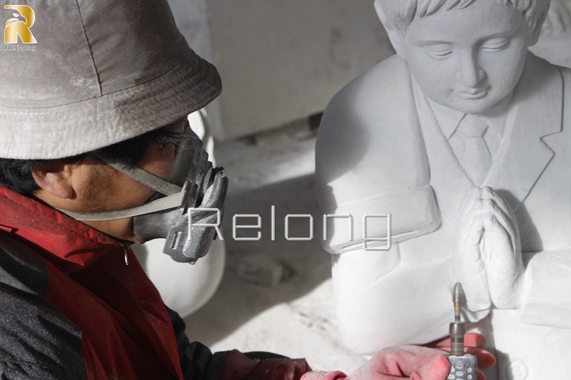 religious marble statue carving