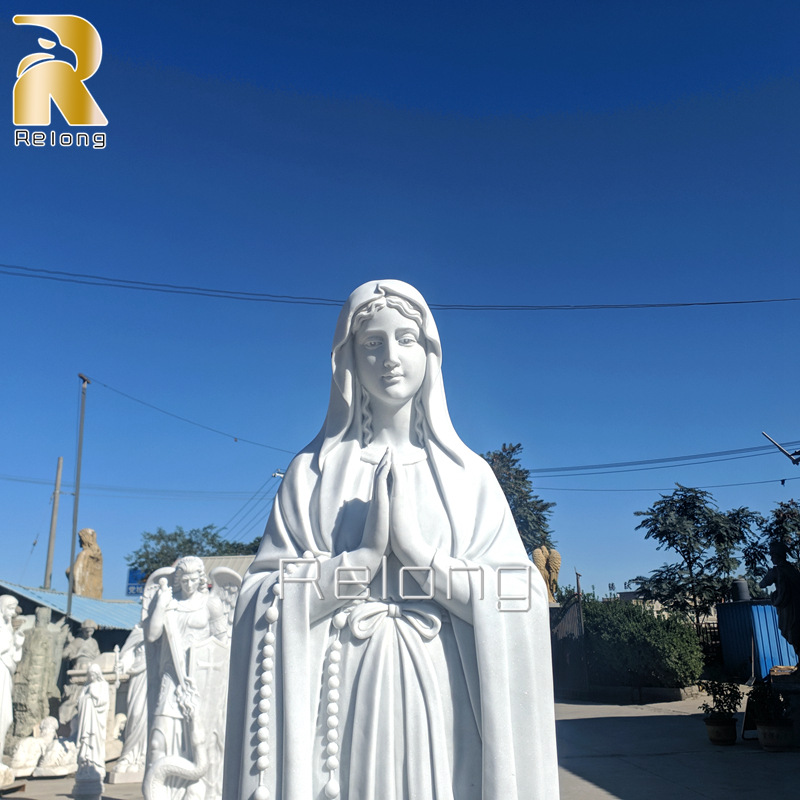 white our lady of Lourdes statue