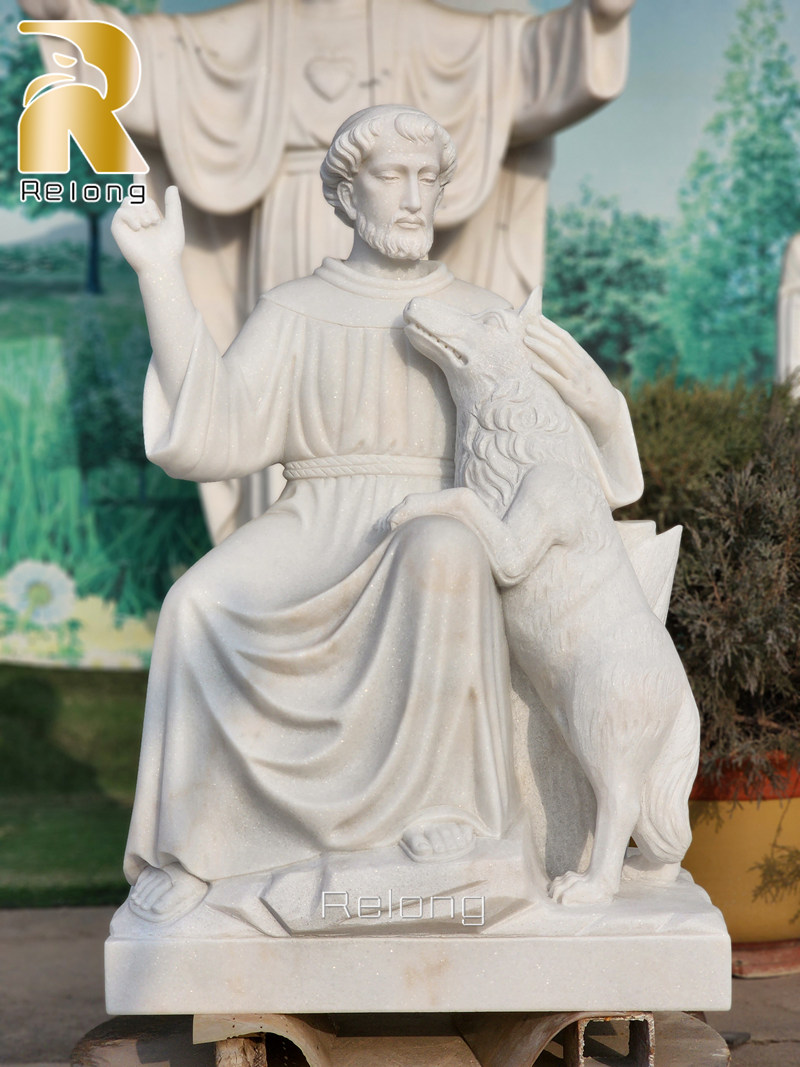 marble St. Francis statue with wolf
