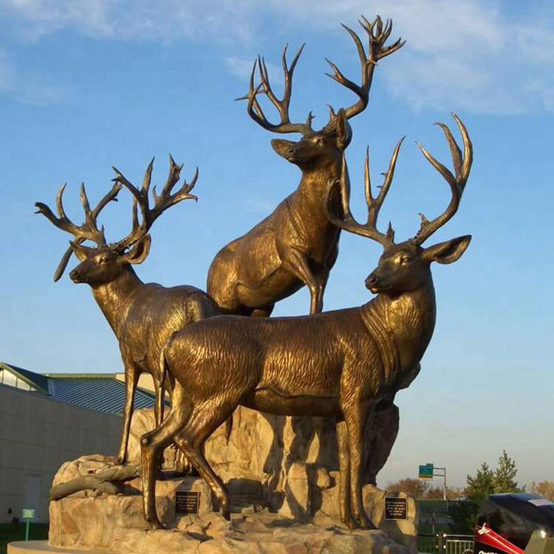 three deer group sculpture