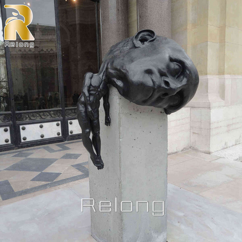 big head statue