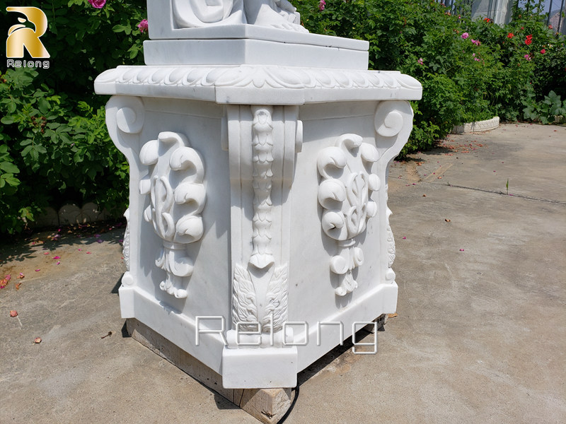 intriicate carvings of marble statue lamp