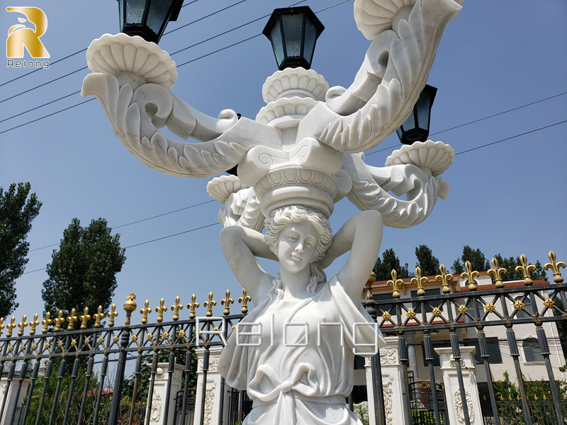 white marble statue lamp
