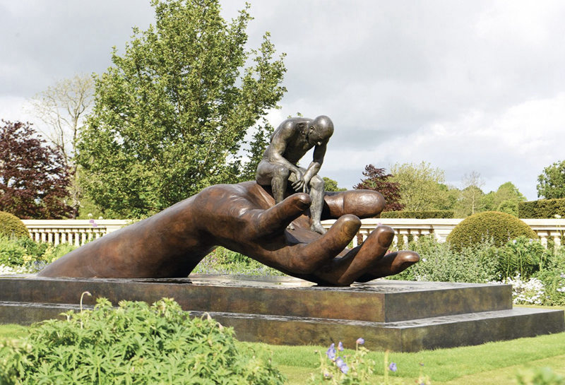large bronze hand sculpture