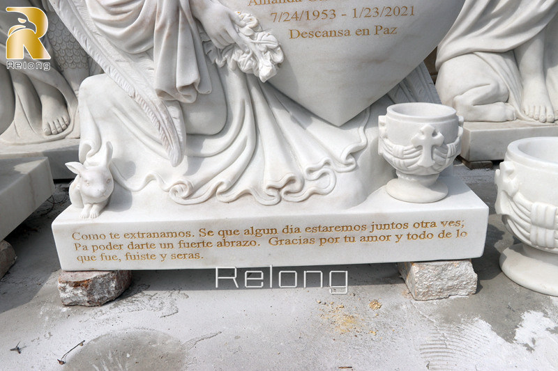 marble angel tombstone carving detail
