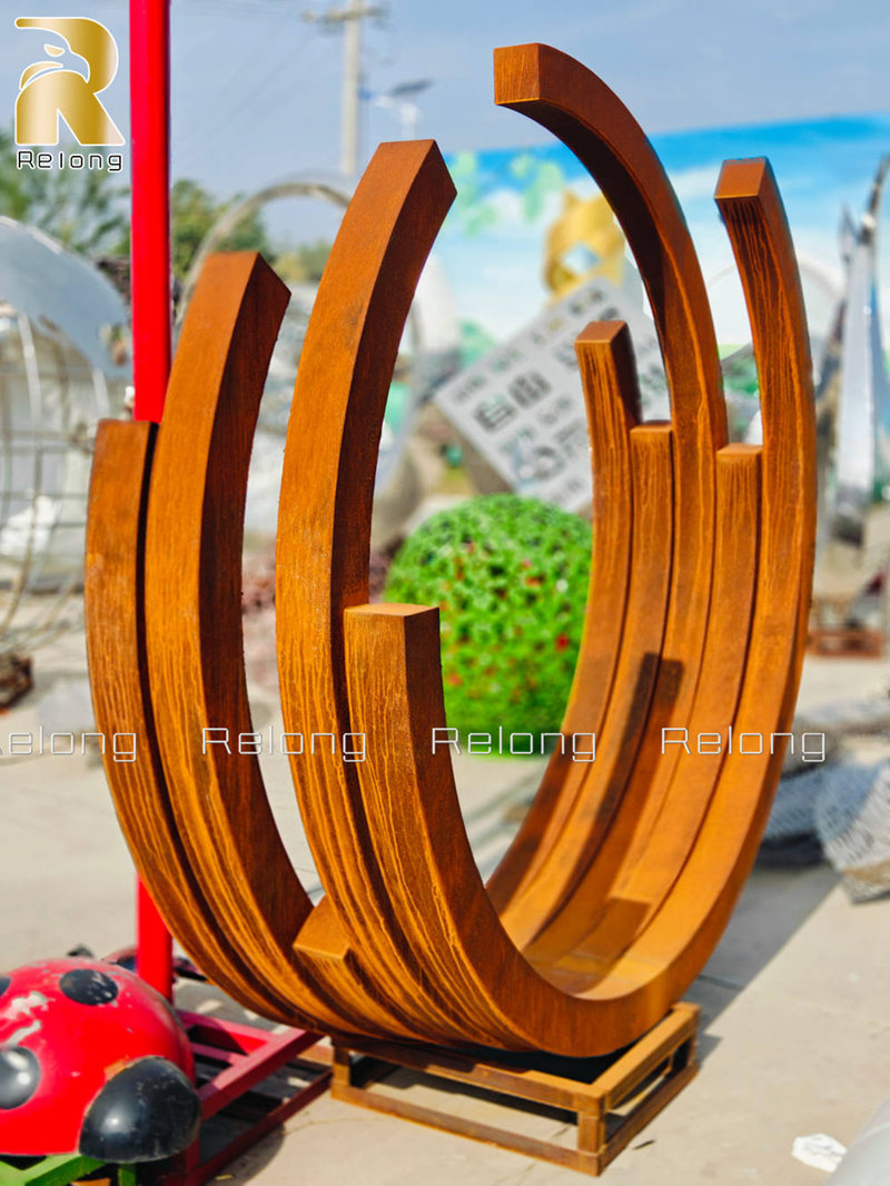 completed large corten steel ring sculpture