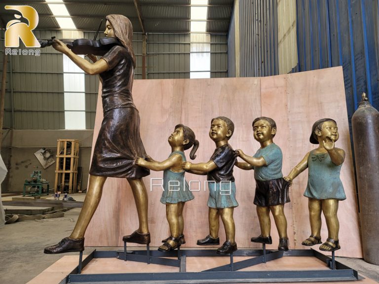 Custom bronze teacher and child sculpture