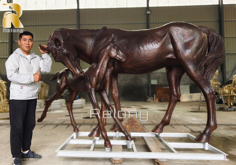 life size bronze mare and horse statue