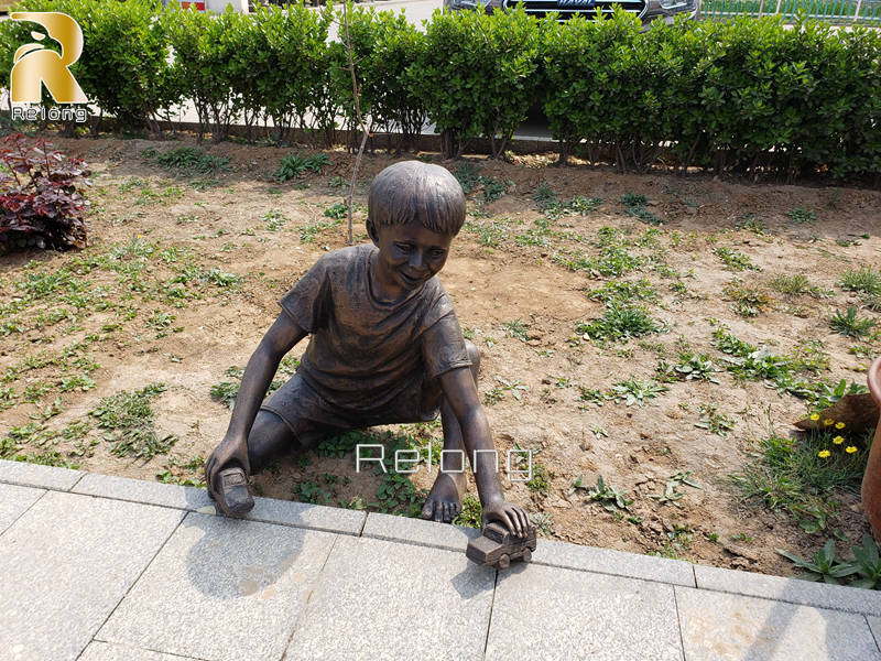 bronze boy sculpture