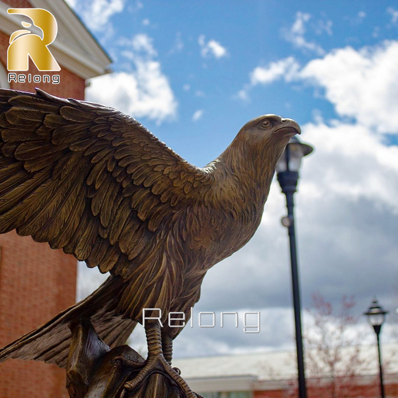 outdoor bronze falcon sculpture