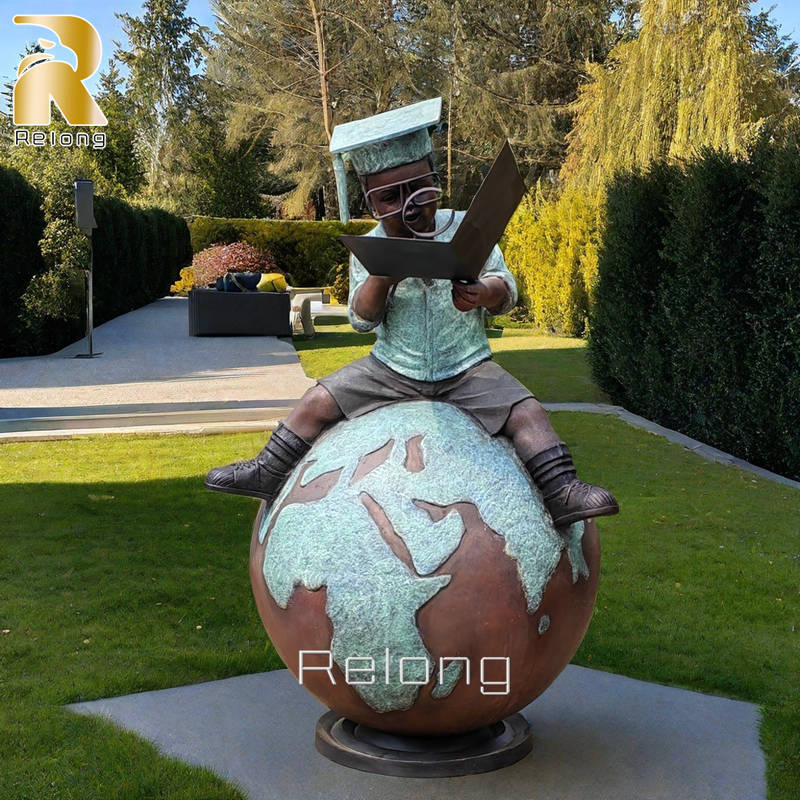 bronze boy reading statue for garden decor