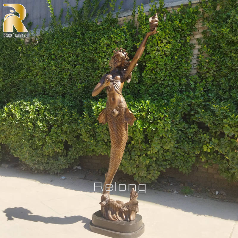 beautiful bronze cast mermaid statue