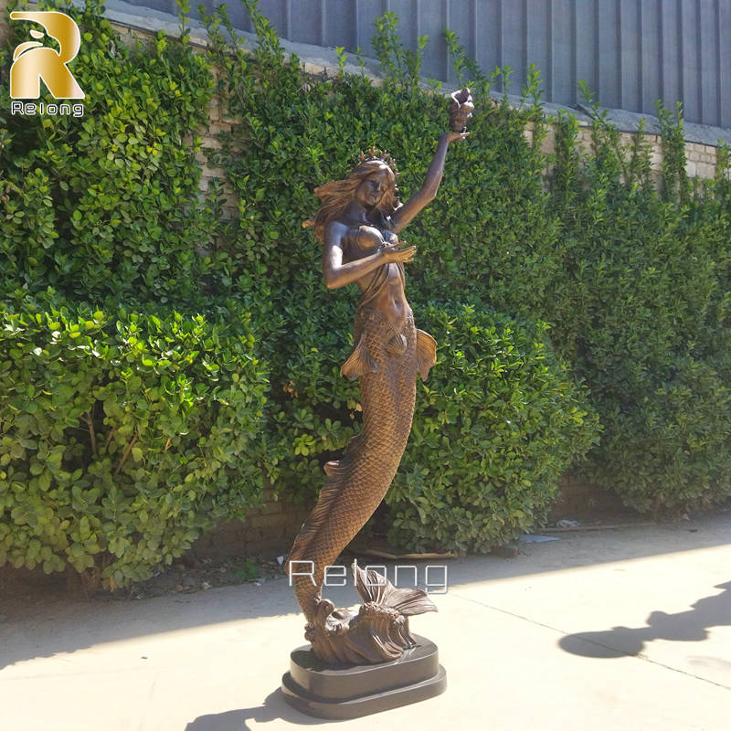 lifelike mermaid statue