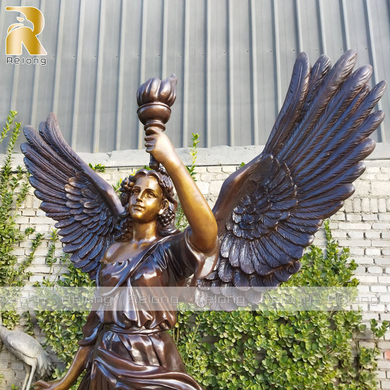 delicate bronze angel statue