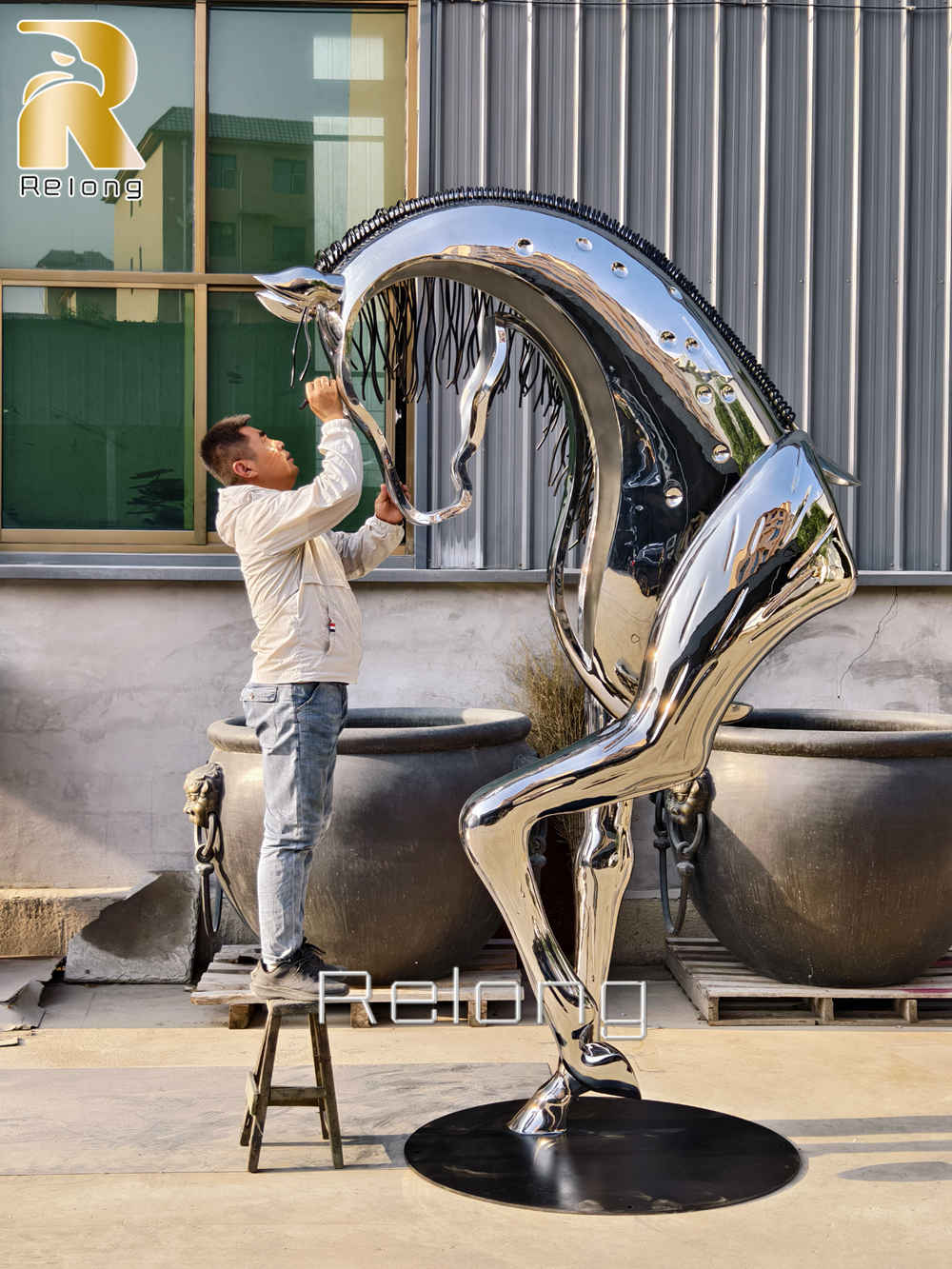 large stainless steel horse head sculpture