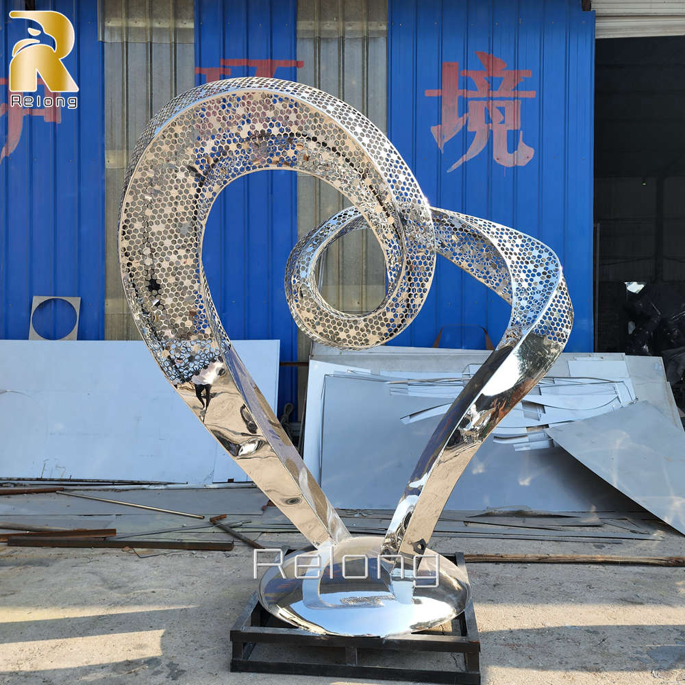 modern stainless steel heart sculpture