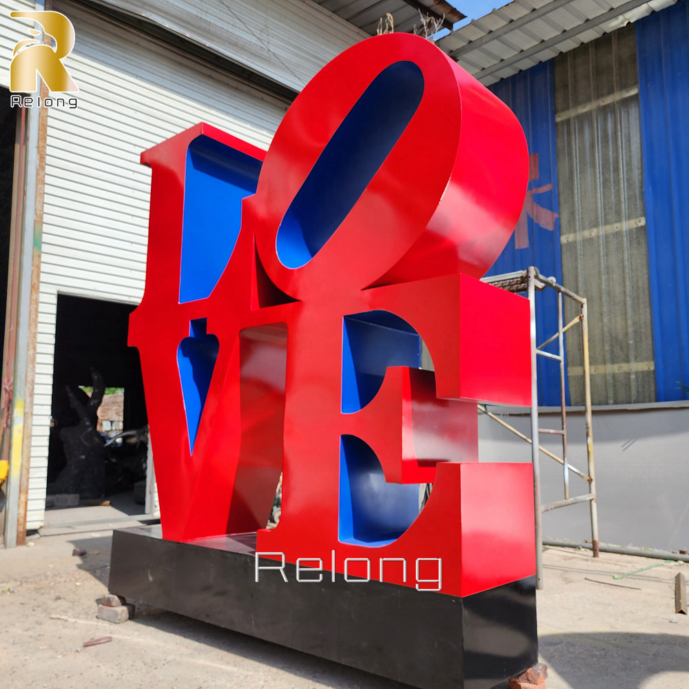 red paint stainless steel love sculpture