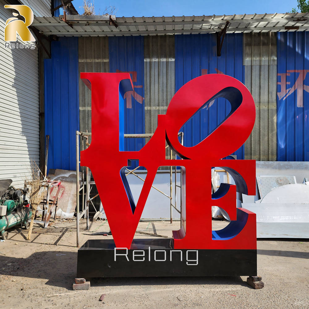 red stainless steel love sculpture