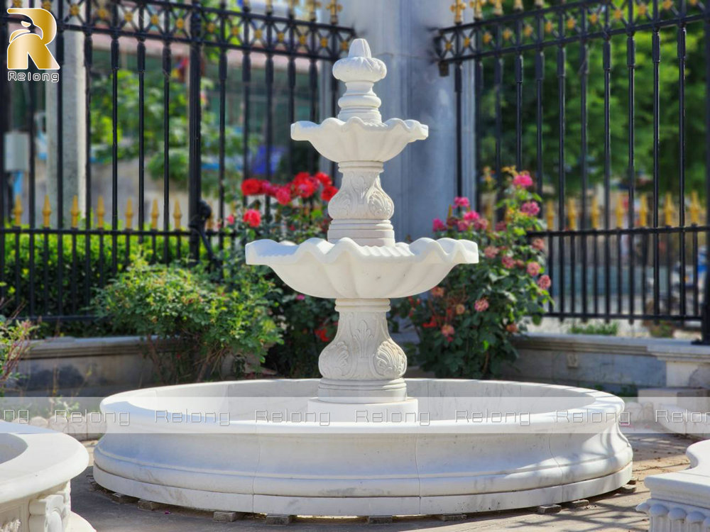 beautiful white three-tier fountain