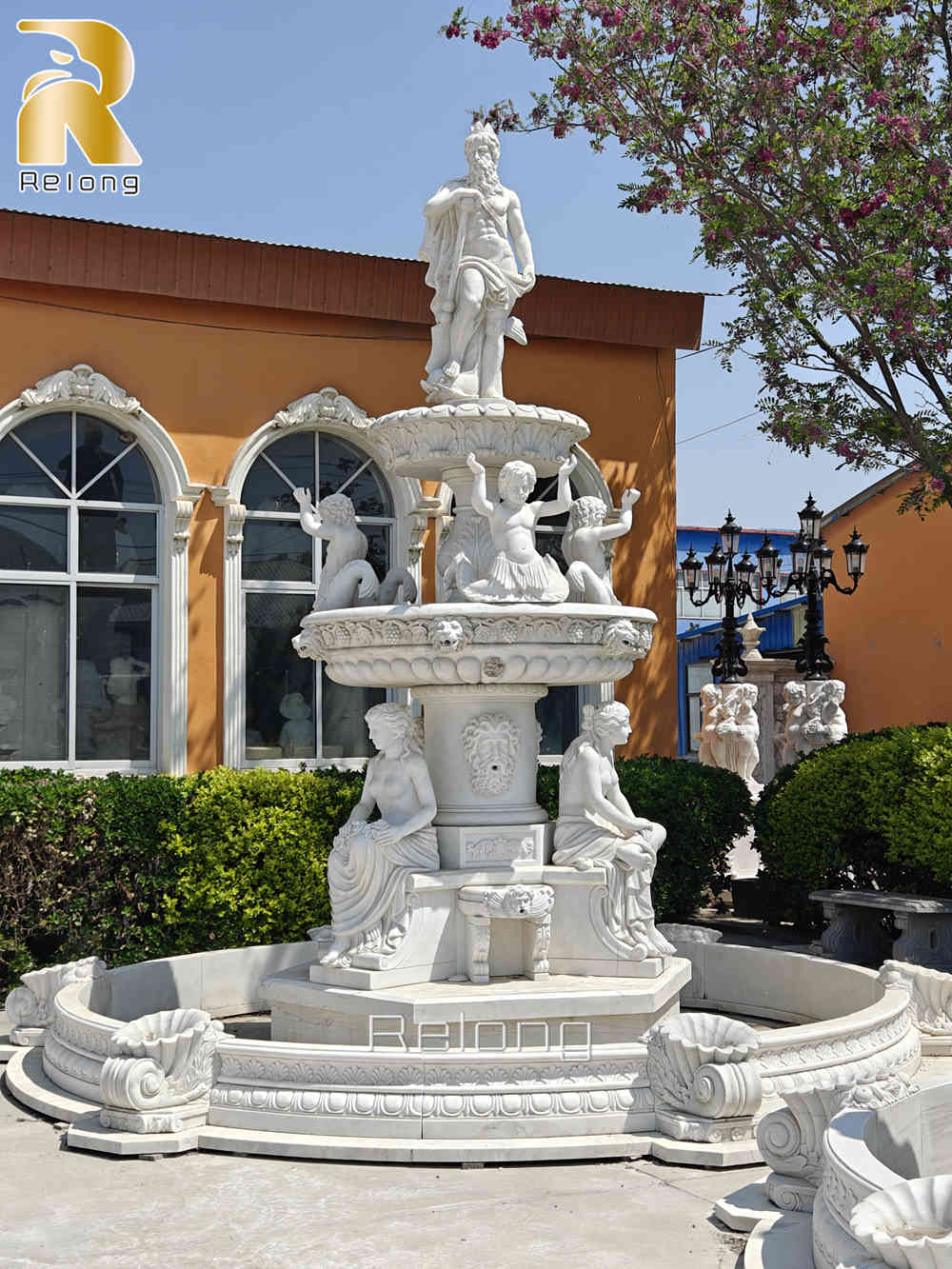marble fountain with greek figures
