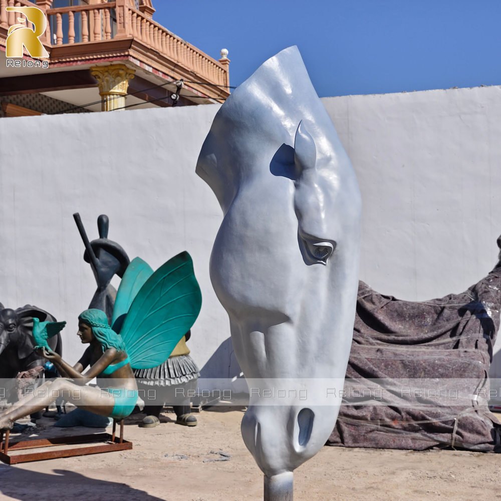 white bronze horse head statue