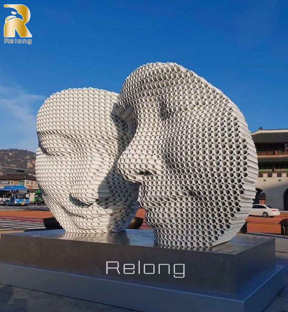 famous stainless steel face sculpture