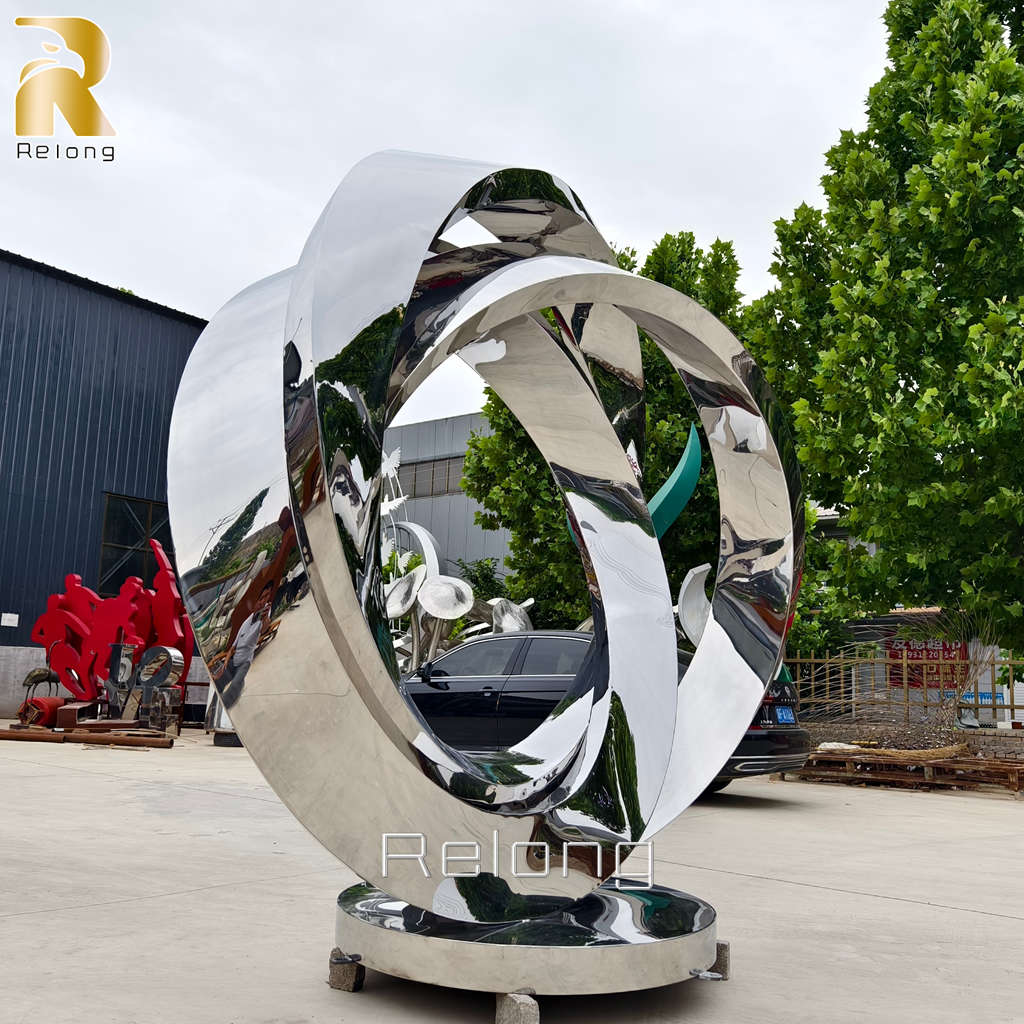 mirror polished metal ring sculpture