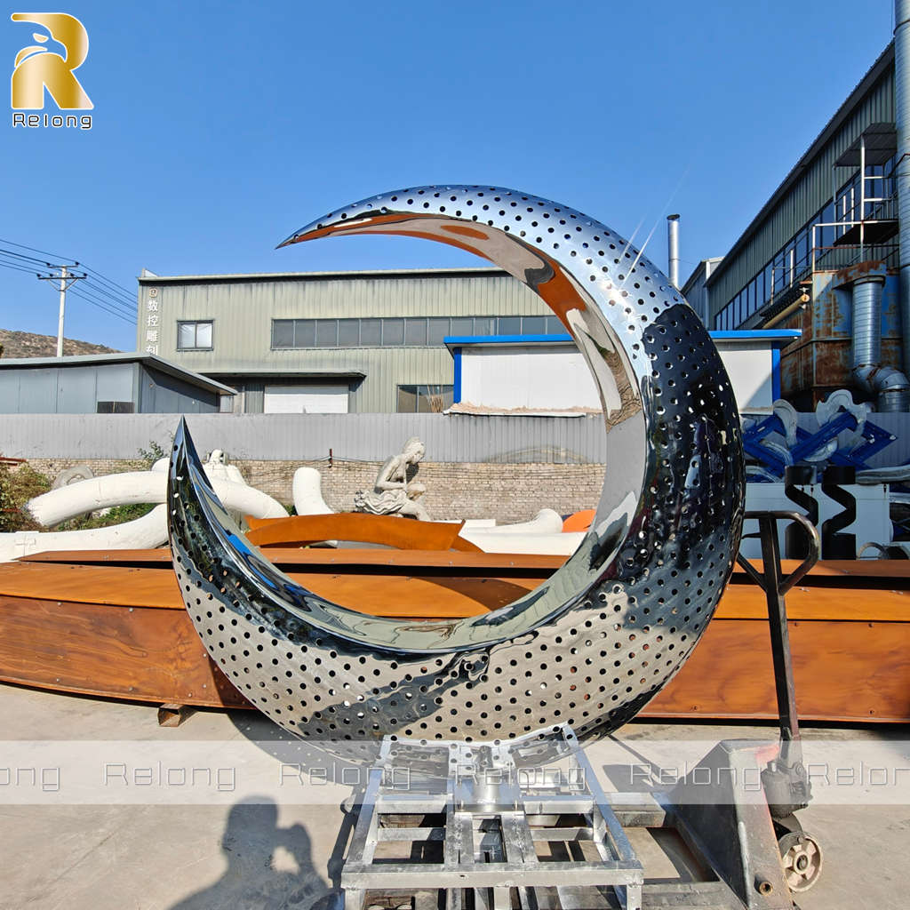 modern stainless steel moon sculpture
