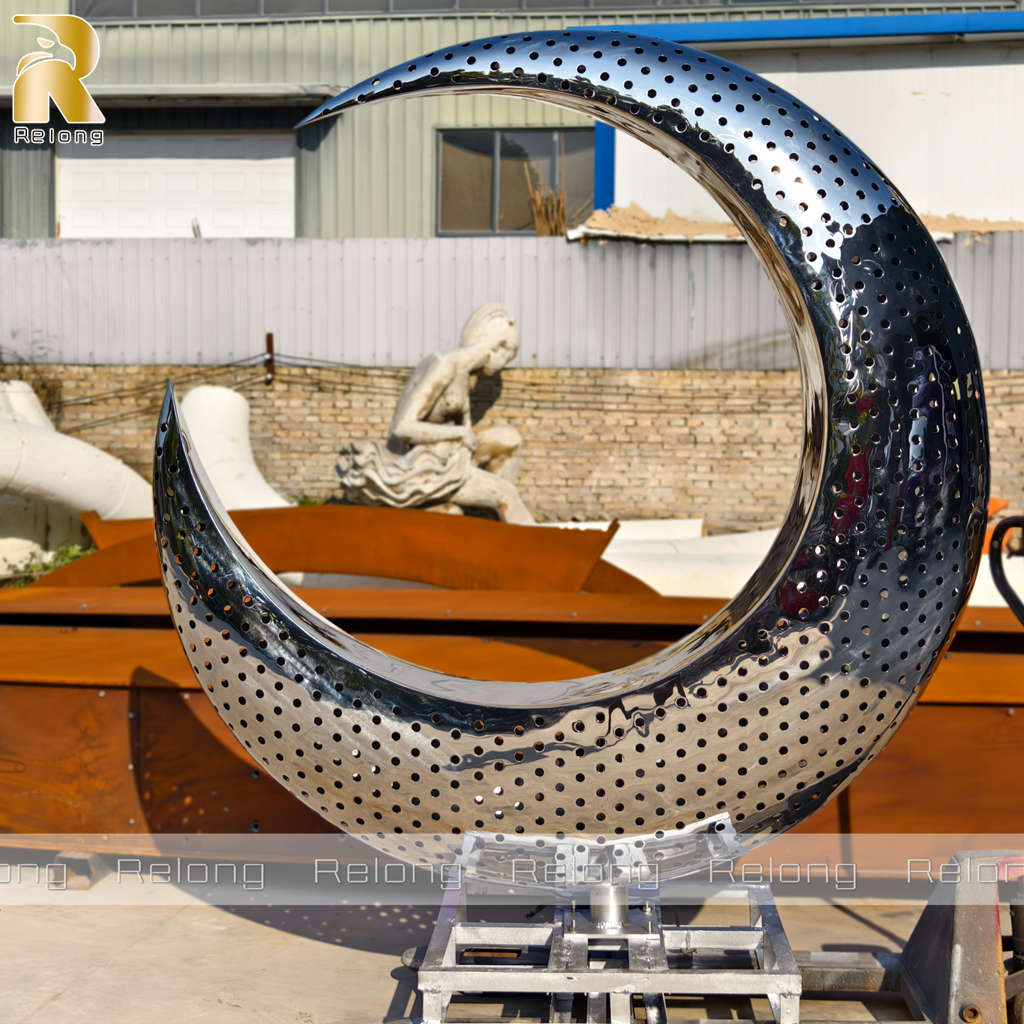 stainless steel half moon sculpture