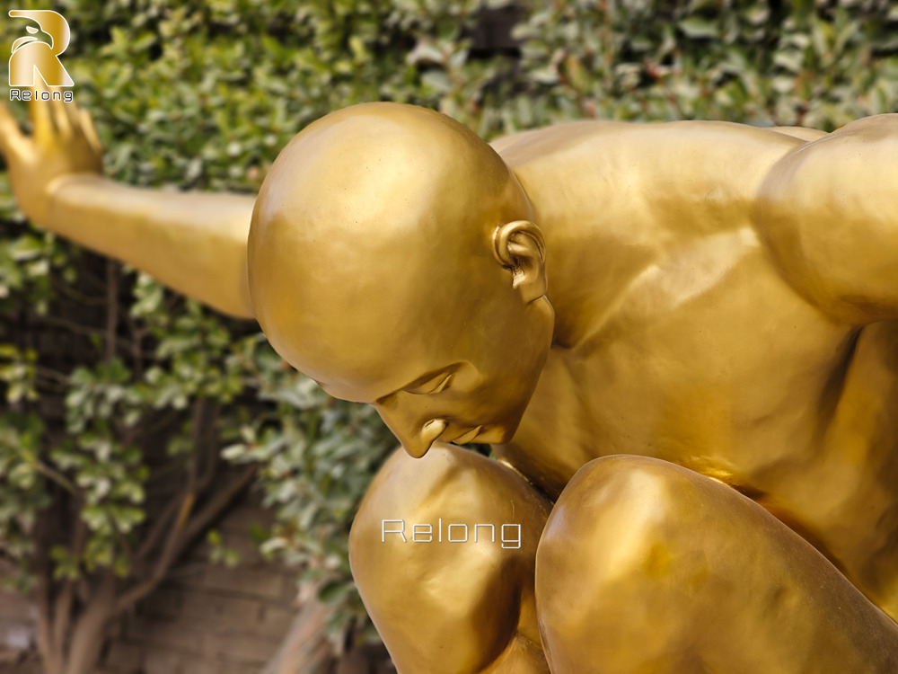 diving man sculpture details