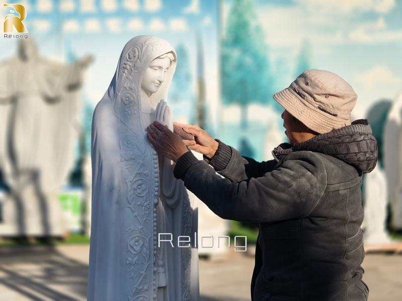 hand carved mary statue