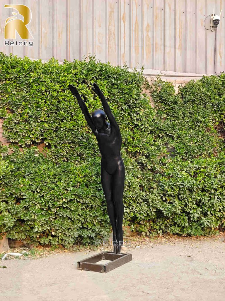 outdoor bronze man sculpture