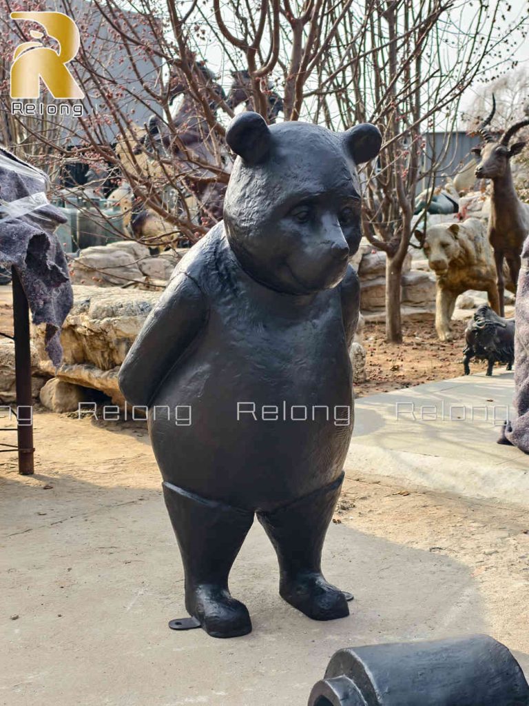 bronze cast winne sculpture