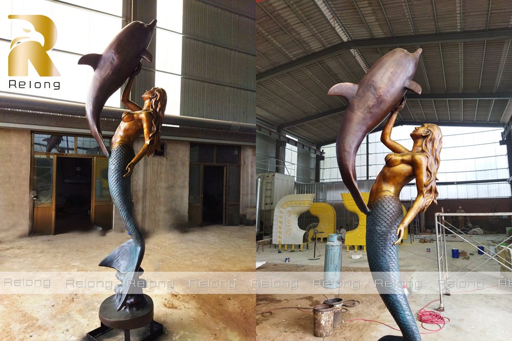 mermaid and dolphin statue details