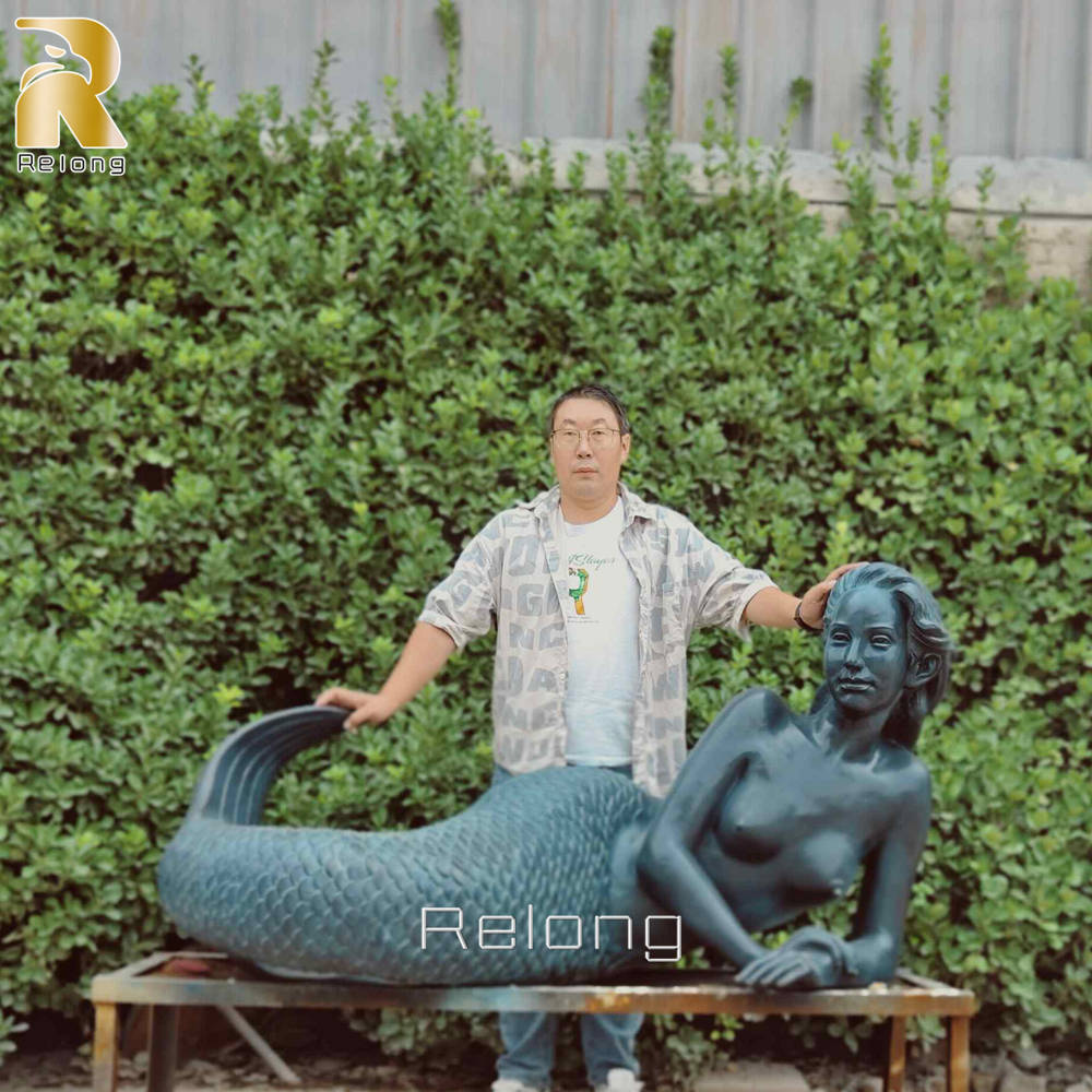 life size mermaid lying down statue