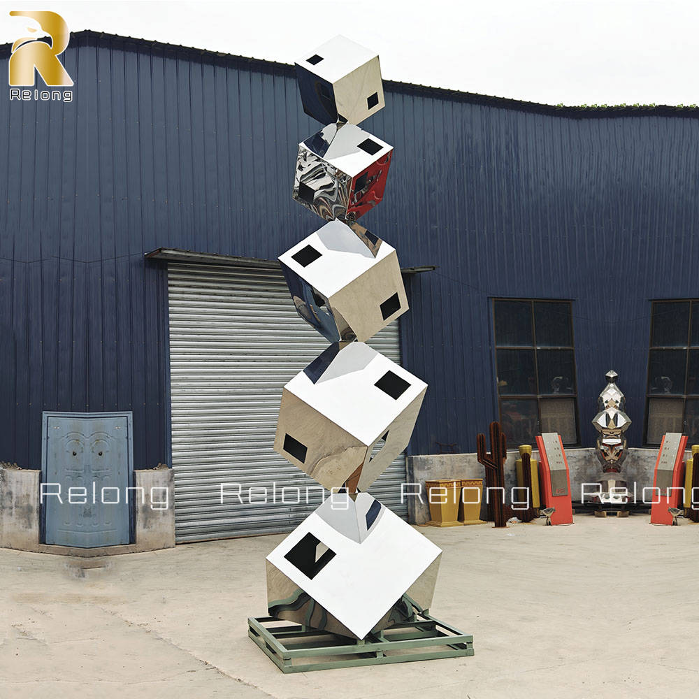 large stainless steel cube sculpture