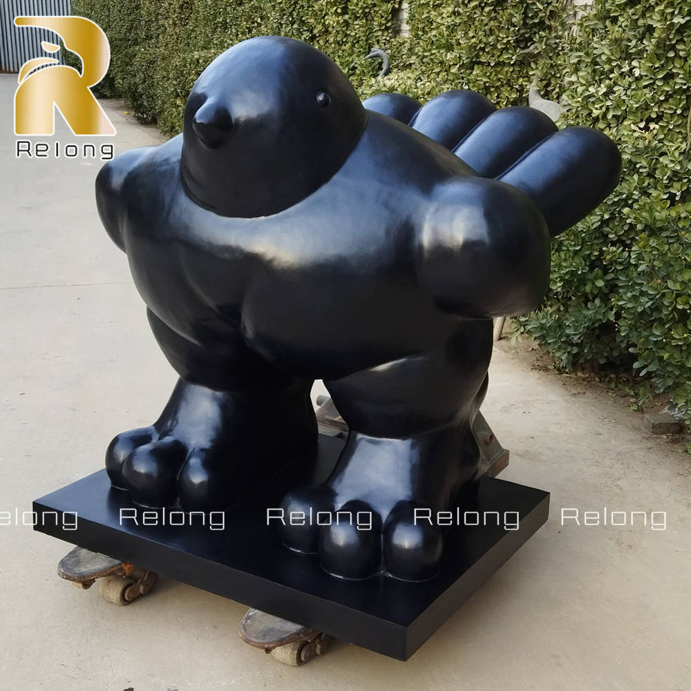 bronze fat bird sculpture