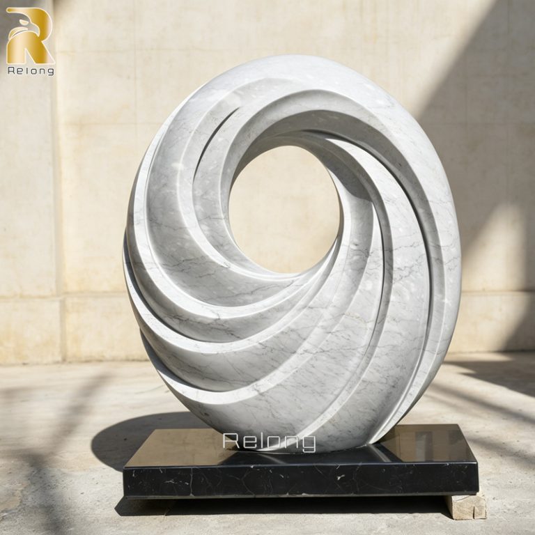 hand carved white marble sculpture