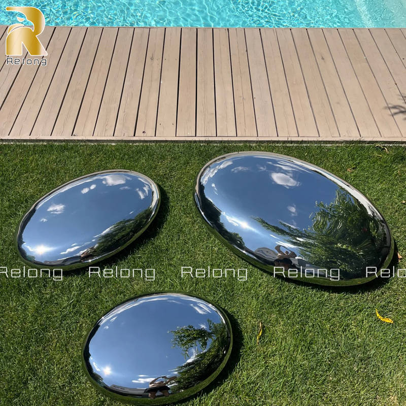 modern pebble sculpture for pool decor