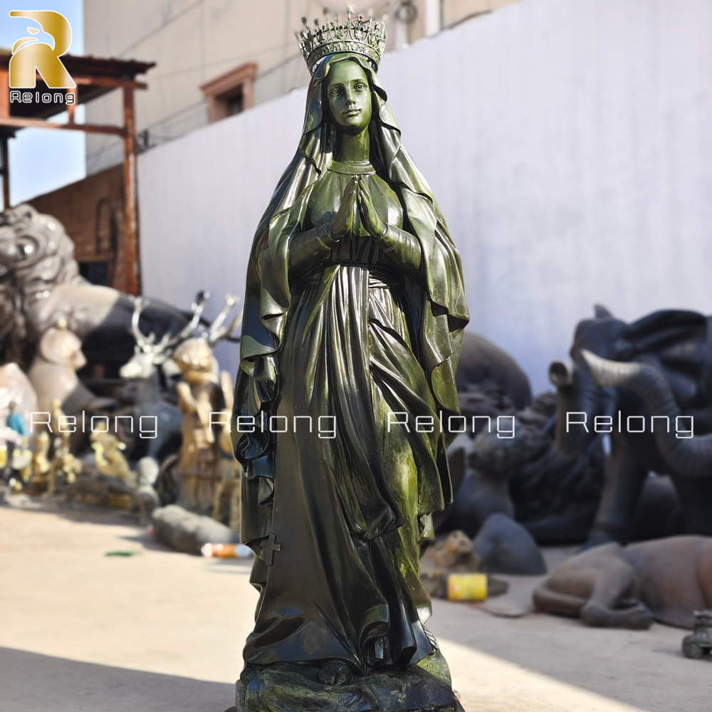 bronze Praying Virgin Mary statue at Relong Factory