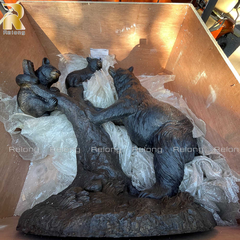 bear and tree sculpture