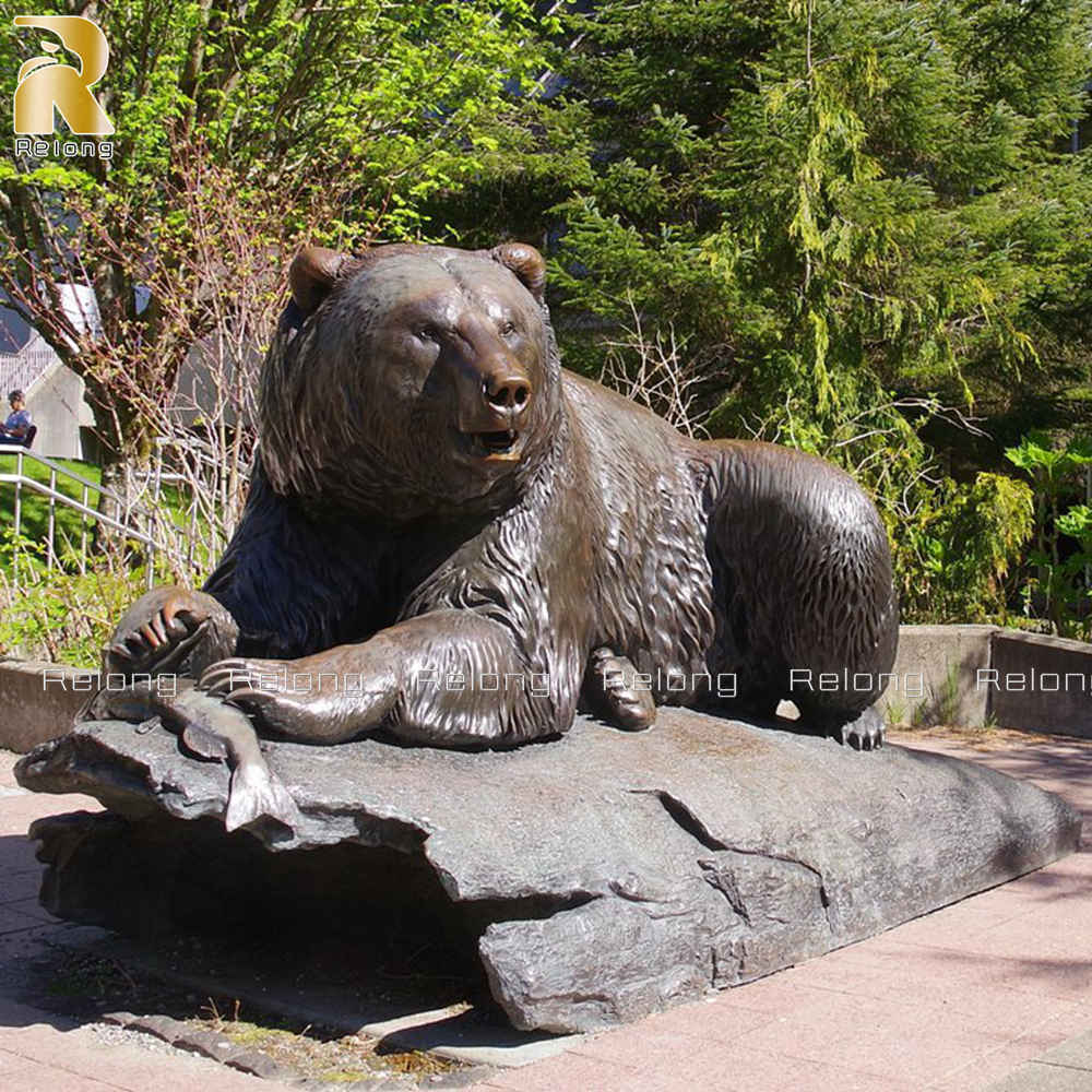 bear catching fish sculpture