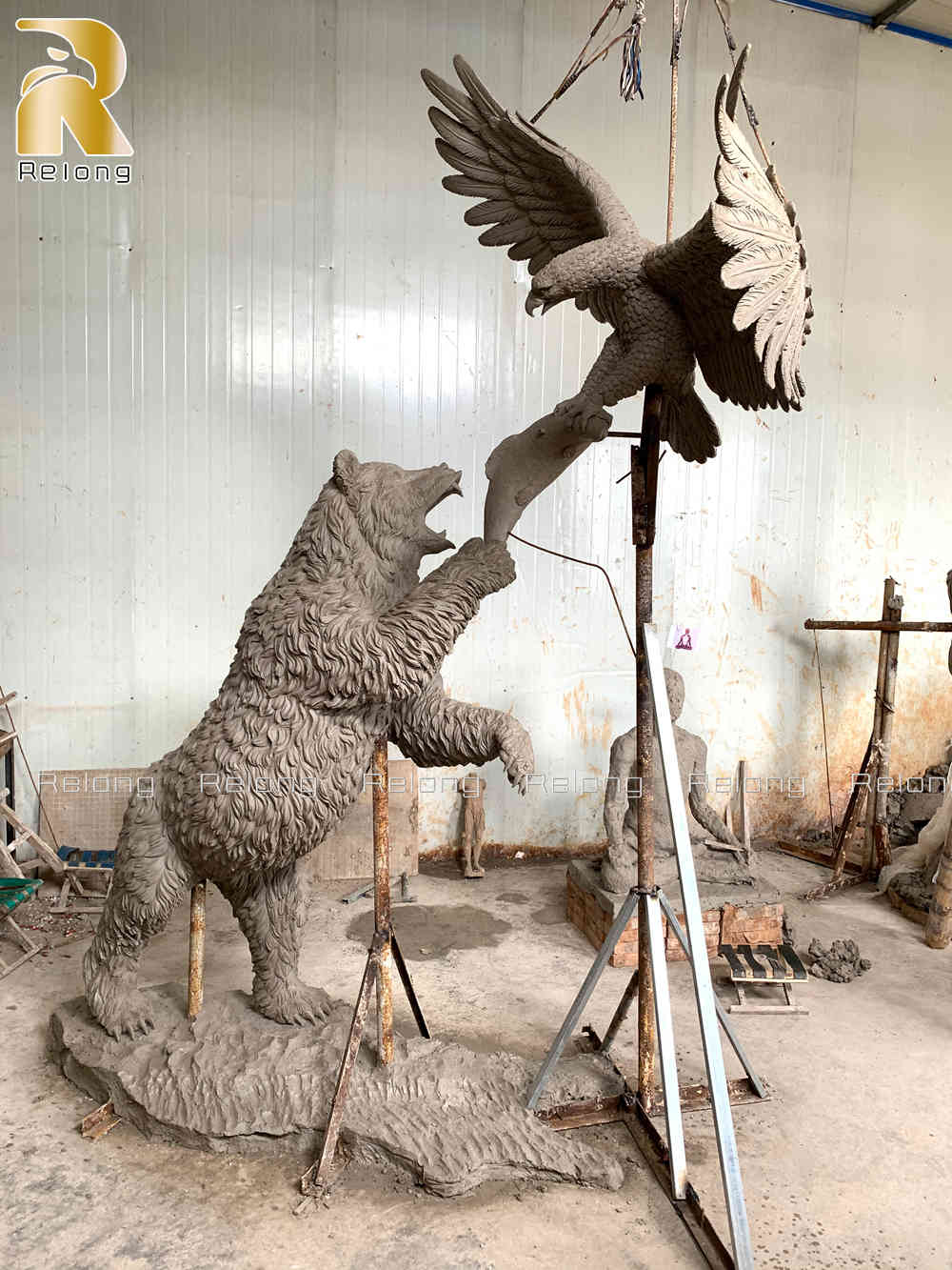 Bear and eagle clay model