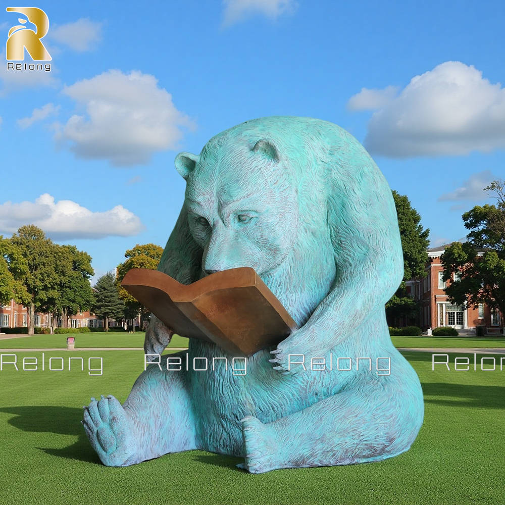 bronze reading bear statue
