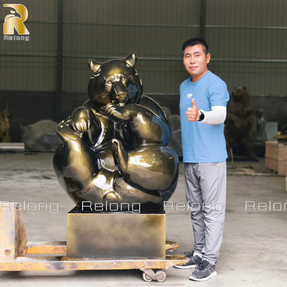 bronze sitting bear sculpture